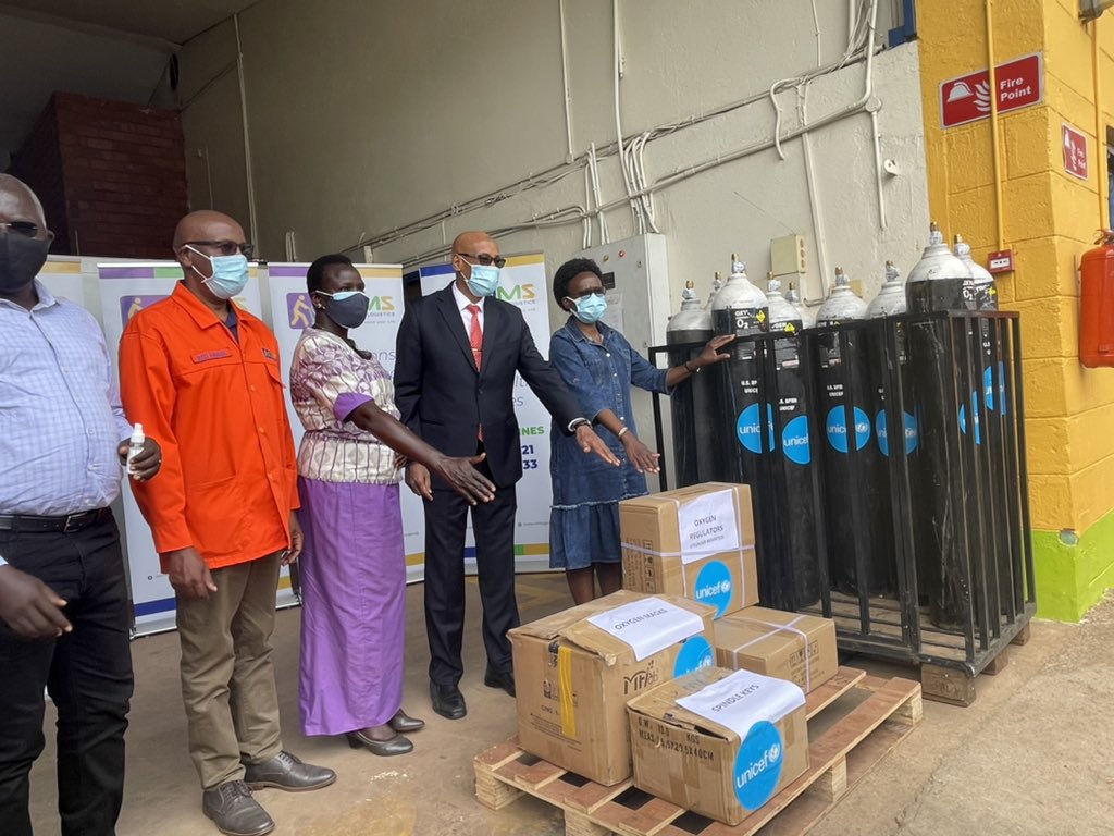 Minister Aceng receiving a donation of oxygen cylinders from Unicef on Saturday