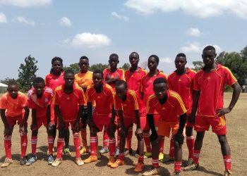 Buddu Soccer Academy football players during their unveiling last weekend at Kyabakuza Playground