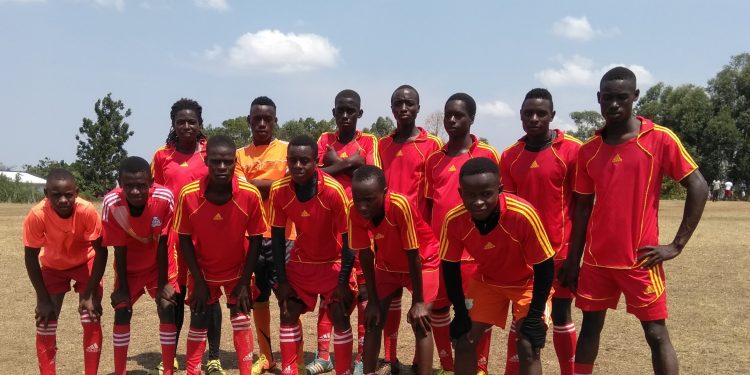 Buddu Soccer Academy football players during their unveiling last weekend at Kyabakuza Playground