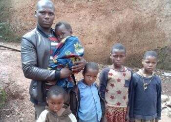 Sabiti Laban with his five children