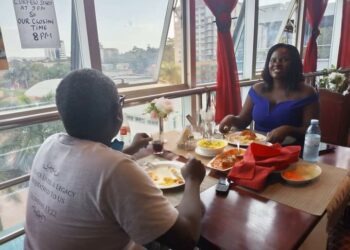 Nantongo with her ex husband having a meal