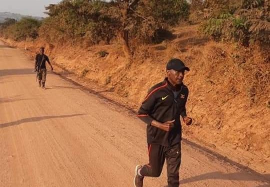 Gen Kayihura making road work exercise on Sunday