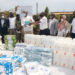 Kalangala Infrastructure Services (KIS) Marketing and Public Relations Manager Mr Joseph Mulindwa (4th right) hands over a donation of assorted infection prevention and control materials worth Shs32 million to the Chairman District Covid-19 Task Committee and RDC Kalangala, Mr Apollo Mugume recently