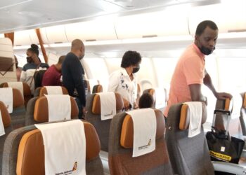 Some of the passengers who took a flight to Dar es Salaam using Uganda Airlines' new Airbus