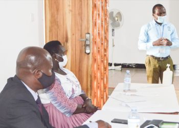 L-R Jackson Chekweko RHU ED - Chebet Evelyne Kubarika Kapchorwa LCV and Robert Ocaya launching RHRN in Kapchorwa