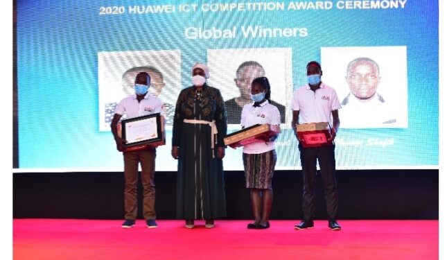 Rt. Hon Rukia with the three Ugandan students who took first position at the Huawei Global ICT Competion.