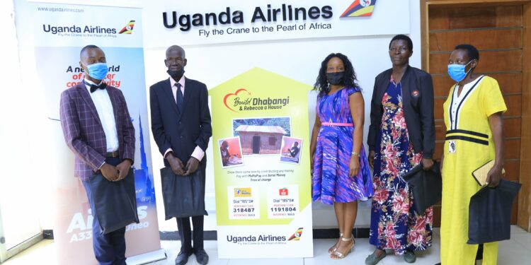 Henry, Dhabangi, Airline's Doreen, Maama Rebecca and Henry's mother at Uganda Airlines Offices on Thursday