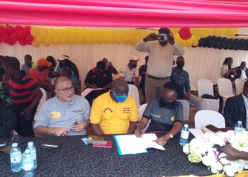 Uganda Airlines CEO Jennifer Bamuturaki and FMU President Dipu Ruparelia sign partnership