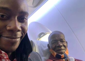 Henry Mutebe and Wilson Dhabangi on Uganda Airlines flight