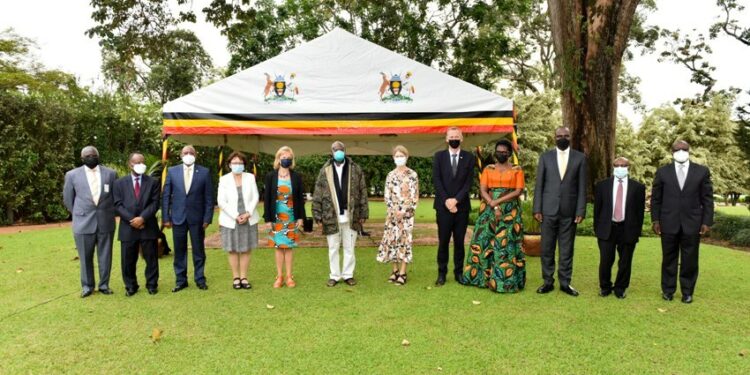 President Yoweri Museveni in a group photo with the Nordic Ambassadors (Sweden, Norway, Denmark, Iceland) and Ugandan officials after a meeting on Economic Development and Co-operation at State House Entebbe on October 21st October 2021. Photo by PPU / Tony Rujuta.