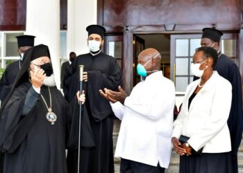 President Museveni and First Lady Janet Museveni share a moment with the Pope an Patriarch of Alexandria and All Africa Beatitude Theodoros II (2nd L) and his delegation after a meeting at Entebbe