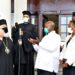 President Museveni and First Lady Janet Museveni share a moment with the Pope an Patriarch of Alexandria and All Africa Beatitude Theodoros II (2nd L) and his delegation after a meeting at Entebbe