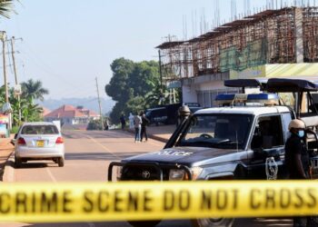 Ugandan police members secure the scene of an explosion in Komamboga, a suburb on the northern outskirts of Kampala, Uganda October 24, 2021. REUTERS/Abubaker Lubowa