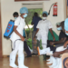 Health workers sanitizing before treating Covid-19 patients