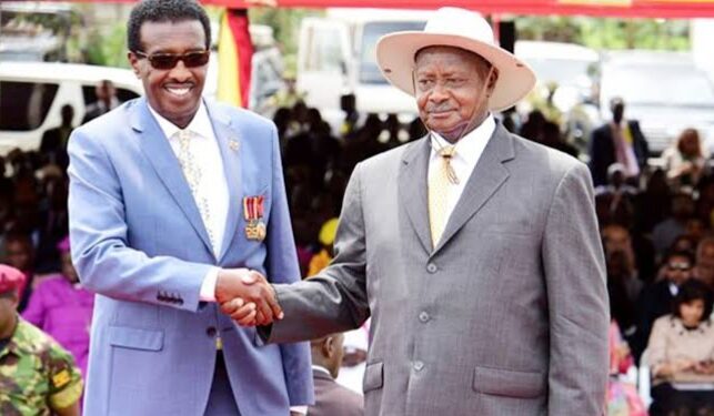 Minister Jim Muhwezi with President Museveni