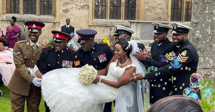 Dr Patrick Ibembe (extreme left) at a Wedding Party in London