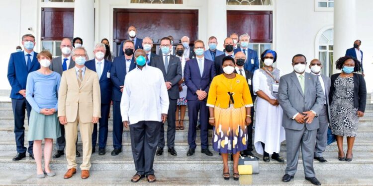 President Yoweri Museveni in a group photo with the ¬¬¬German Ambassador to Uganda H.E Matthias Schauer¬ with German and Ugandan Oficials during his visitto the State House Entebbe on 11th November 2021. Photo by PPU/ Tony Rujuta.