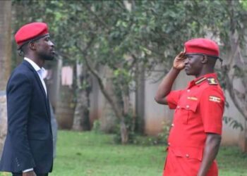 NUP president Bobi Wine and Moses Bigirwa