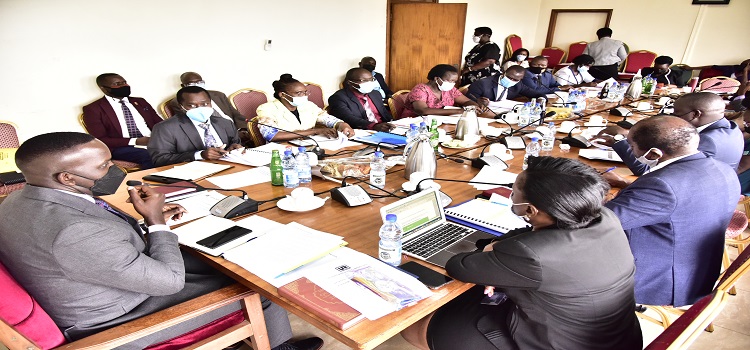 Committee on Cosase chaired by Joel Senyonyi(L) meeting officials of URC