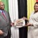 The Deputy Speaker of Parliament, Anita Among, shares a light moment with Zimbabwean Parliament Speaker, Jacob Francis Nzwidamililo Mudenda.