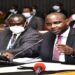 Minister Musasizi(R) makes his presentation before the committee