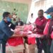MP Betty Nambooze handing over Kabaka Birthday run kits to her constituents