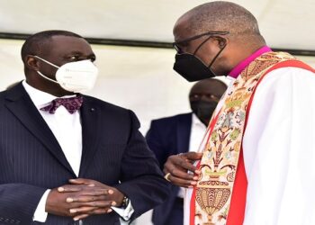 Oulanyah(L) with the former Archbishop of Church of Uganda, Henery Luke Orombi at the event in Gulu