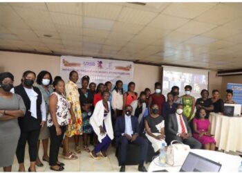 (L-R) Gilbert Agaba, Director Intellectual Property URSB, Caroline Egesa, Board Secretary URSB, James Wasula GSWIM Chairman & Lillian Nantume CEO pose for a group photo with the participants during the workshop at Hotel Africana in Kampala.