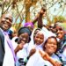 Jackson Chekweko RHU ED with children in Kamuli district