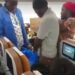 Man hawking grasshoppers on Uganda Airlines flight