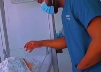 Dr Hamza Ssebunya with their newly born baby