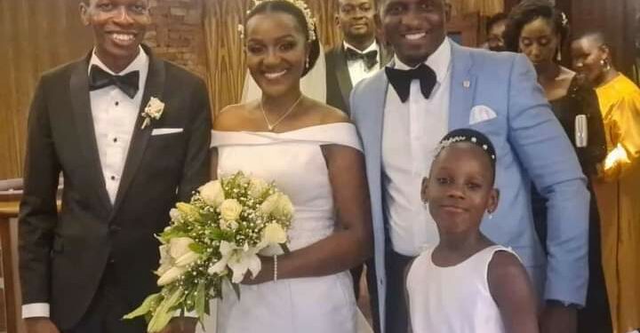 Namuyimba with her husband Chris on their wedding day