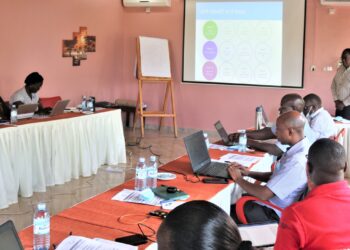 Dr Peter Ibembe addressing Advance Family Planning Uganda members at Kyangabi Crater Resort