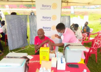 Mukono residents getting vaccinated during the launch of the COVID-19 vaccination drive in Namanve