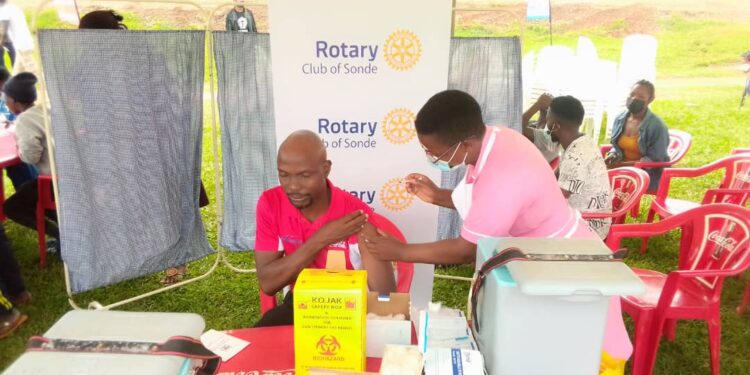 Mukono residents getting vaccinated during the launch of the COVID-19 vaccination drive in Namanve