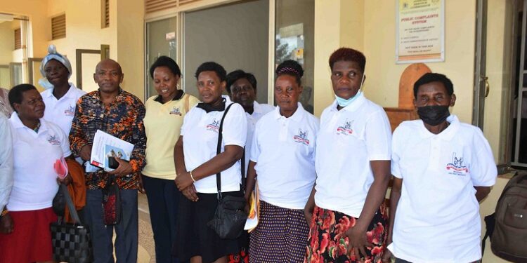 Mukono Women Leaders and UWESO delegates from Kampala after signing a memorandum