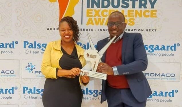Uganda Commercial Director Isaac Sekasi and Vivienne Olenyo, Frontline Marketing Manager – Uganda, Coca-Cola East and Central Africa Franchise after receiving the award