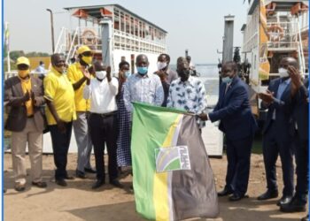 UNRA Board Chairperson, Hon. Fred Jachan Omach and UNRA’s JB Ssejemba flagging off the ferry