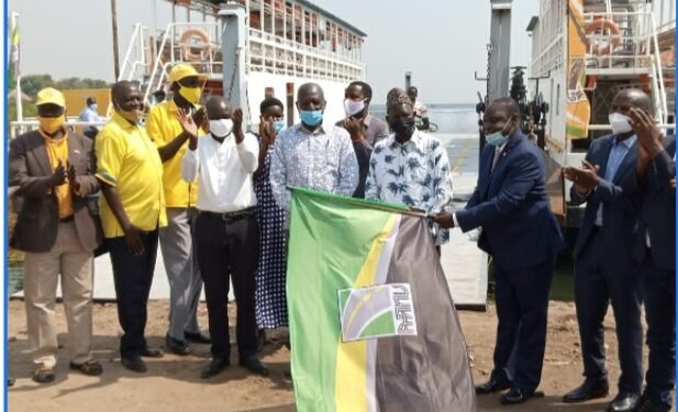 UNRA Board Chairperson, Hon. Fred Jachan Omach and UNRA’s JB Ssejemba flagging off the ferry