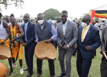 Speaker Jacob Oulanyah (centre) with Agago and Pader MPs dancing Laraka raka at the Youth Day celebrations in Agago District