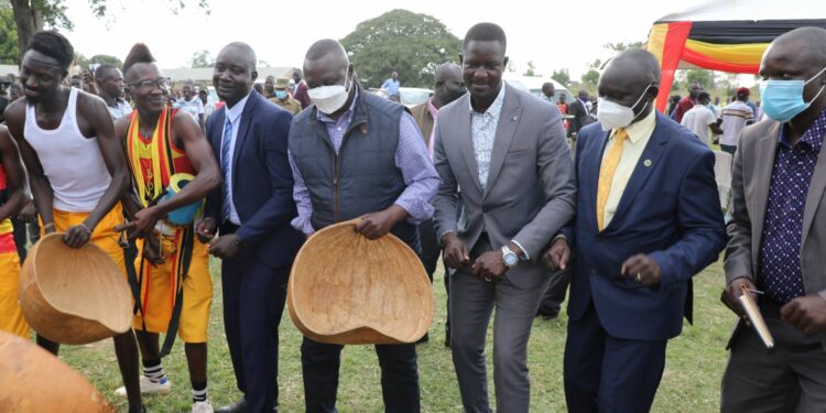 Speaker Jacob Oulanyah (centre) with Agago and Pader MPs dancing Laraka raka at the Youth Day celebrations in Agago District
