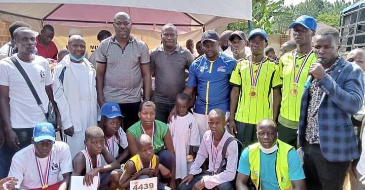 Councillor Mike Ssegawa, MP Sebamala with some of the participants in the half marathon