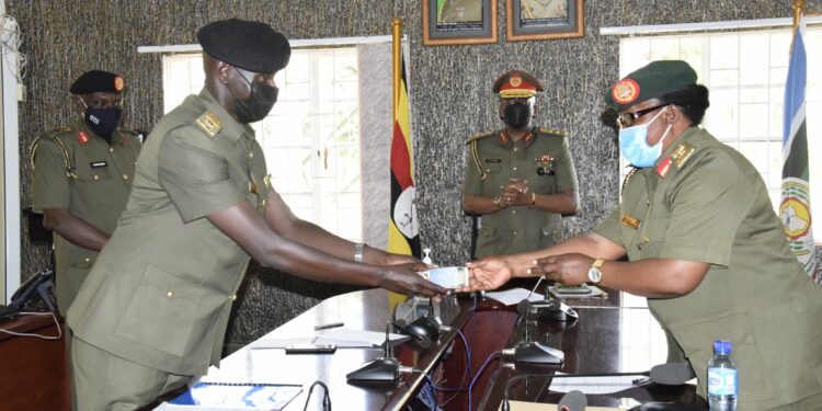 Brig Gen Flavia Byekwaso hands over office to Lt Col Ronald Kakurungu