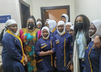 Minister Amongi (second left) with Ugandan girls at the EKAL facility in Saudi Arabia on Tuesday