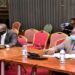 MP Mwine Mpaka (C) responding to concerns of the Budget Committee