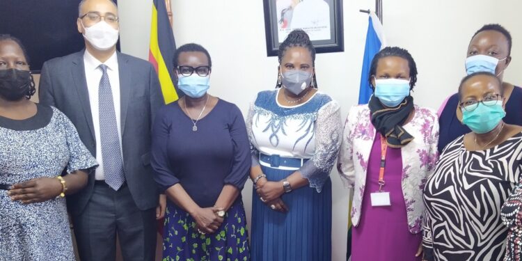 The Gender Minister, Amongi Betty (fourth left) and the UNFPA Country Rep. Dr Mary Otieno