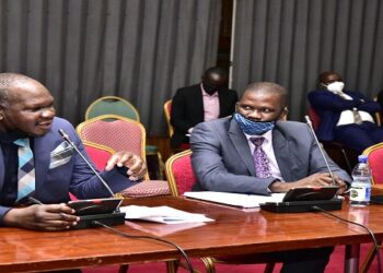 Lakuma(L) with members of his team appearing before the committee