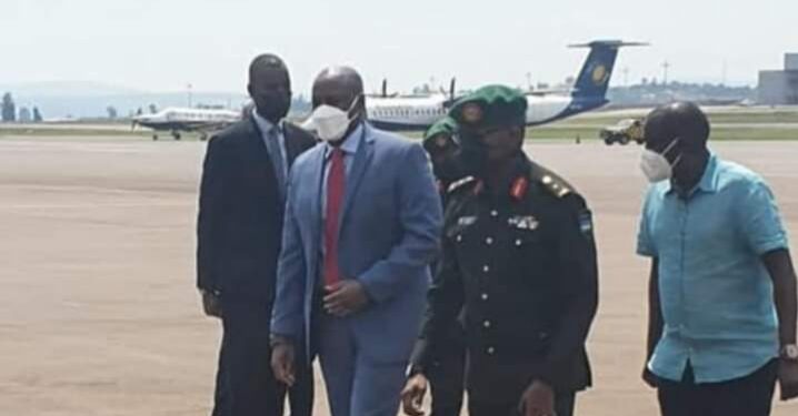 Gen Muhoozi (blue suit) at Kigali International Airport