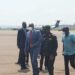 Gen Muhoozi (blue suit) at Kigali International Airport