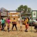 The caravan crew members pose for a photo at Kidepo Valley National park